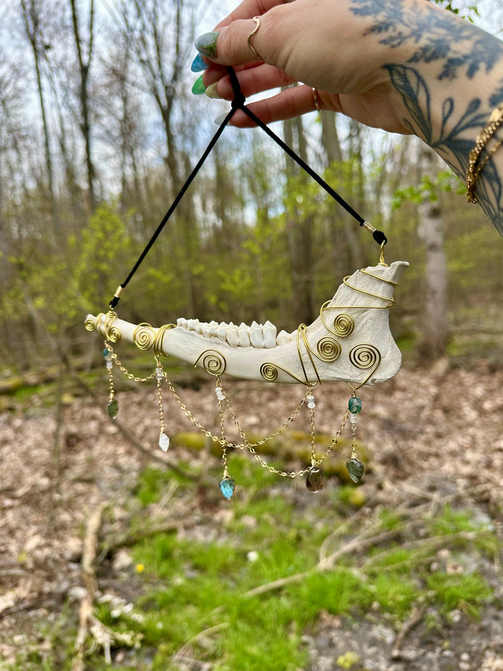 crystal adorned deer bone