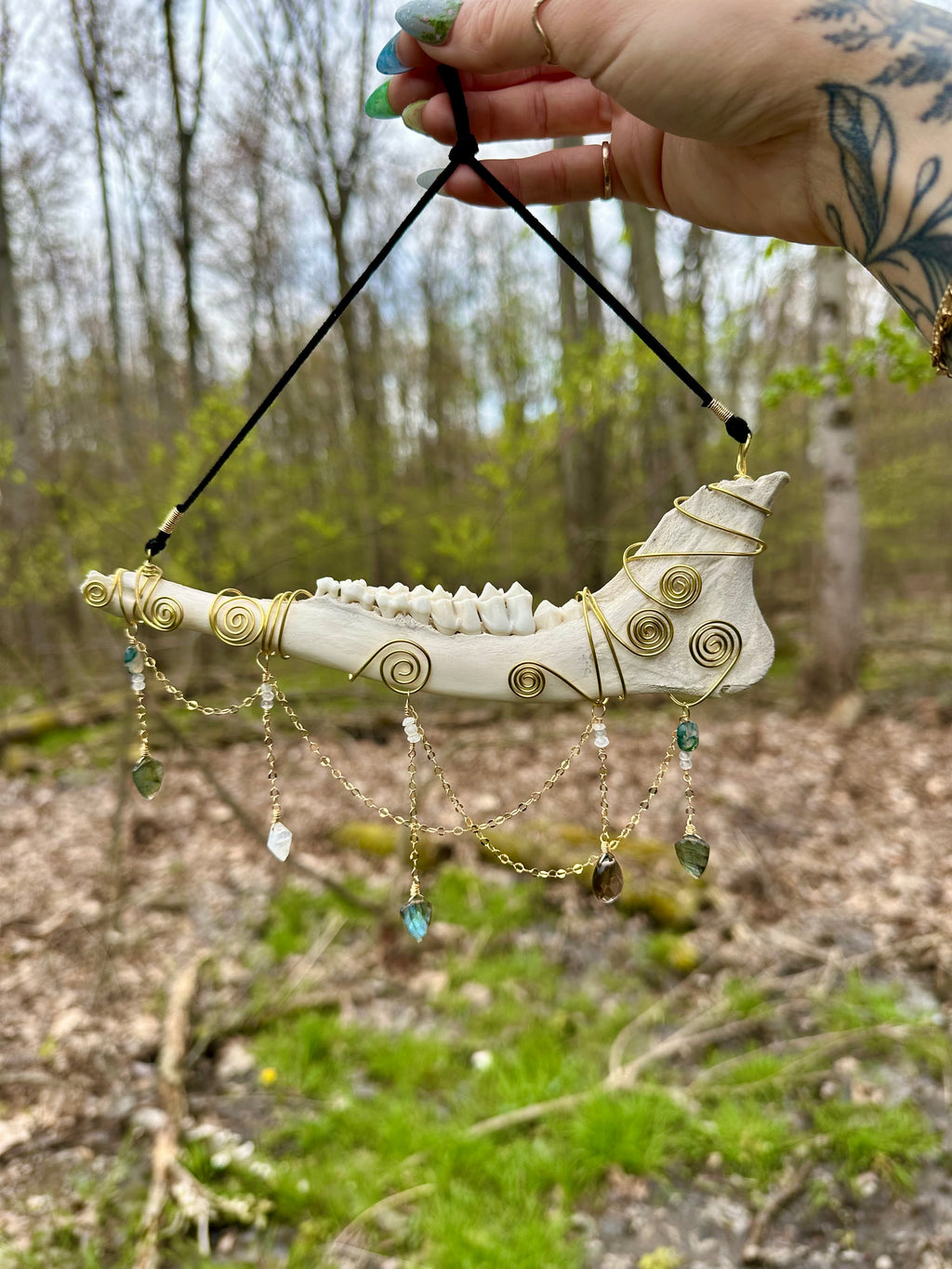 crystal adorned deer bone