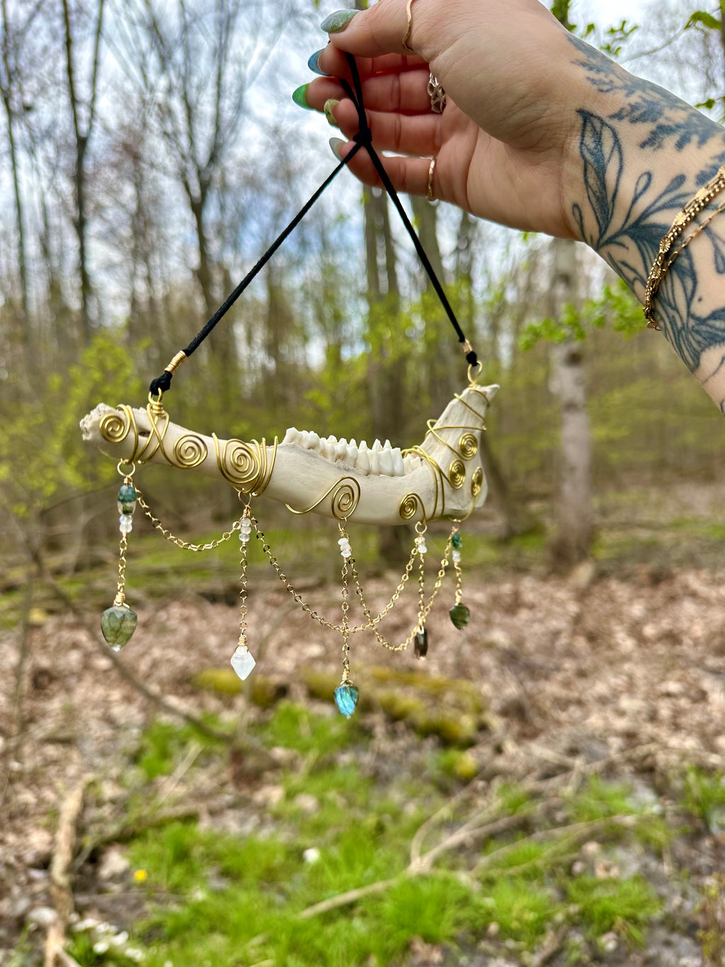 crystal adorned deer bone