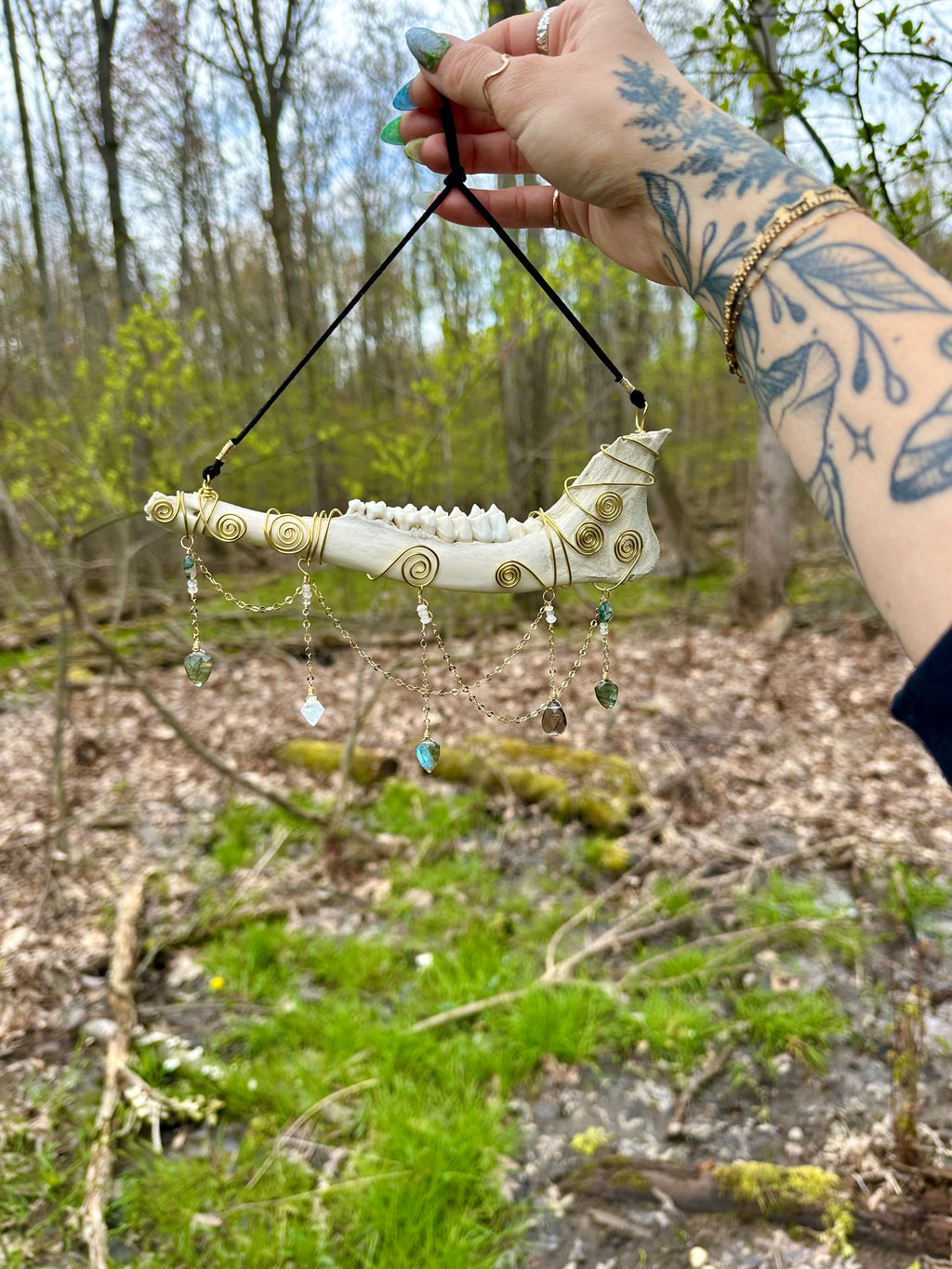 crystal adorned deer bone