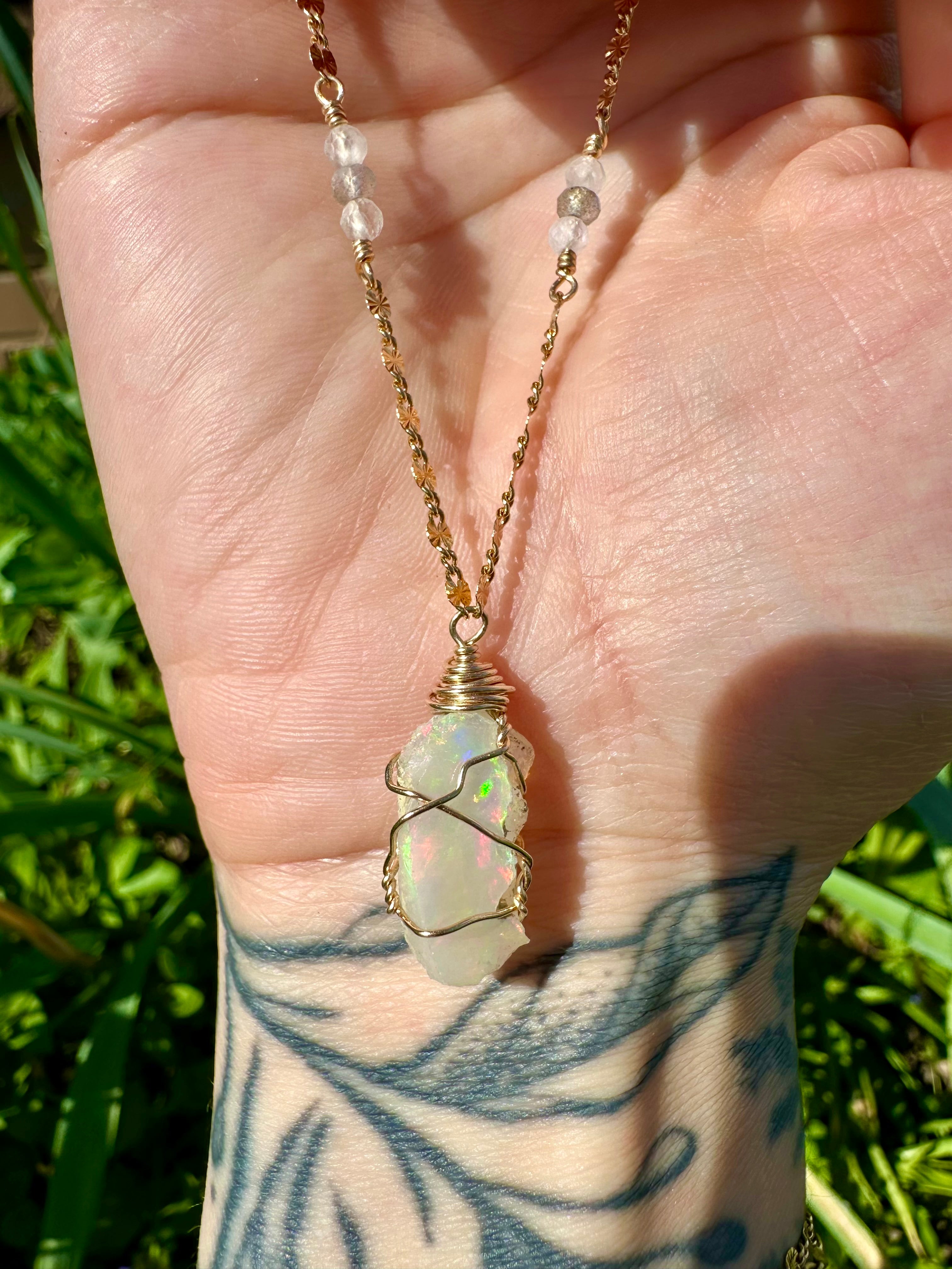 *one of one* ♡ iridescent raw opal necklace in 14k gold *