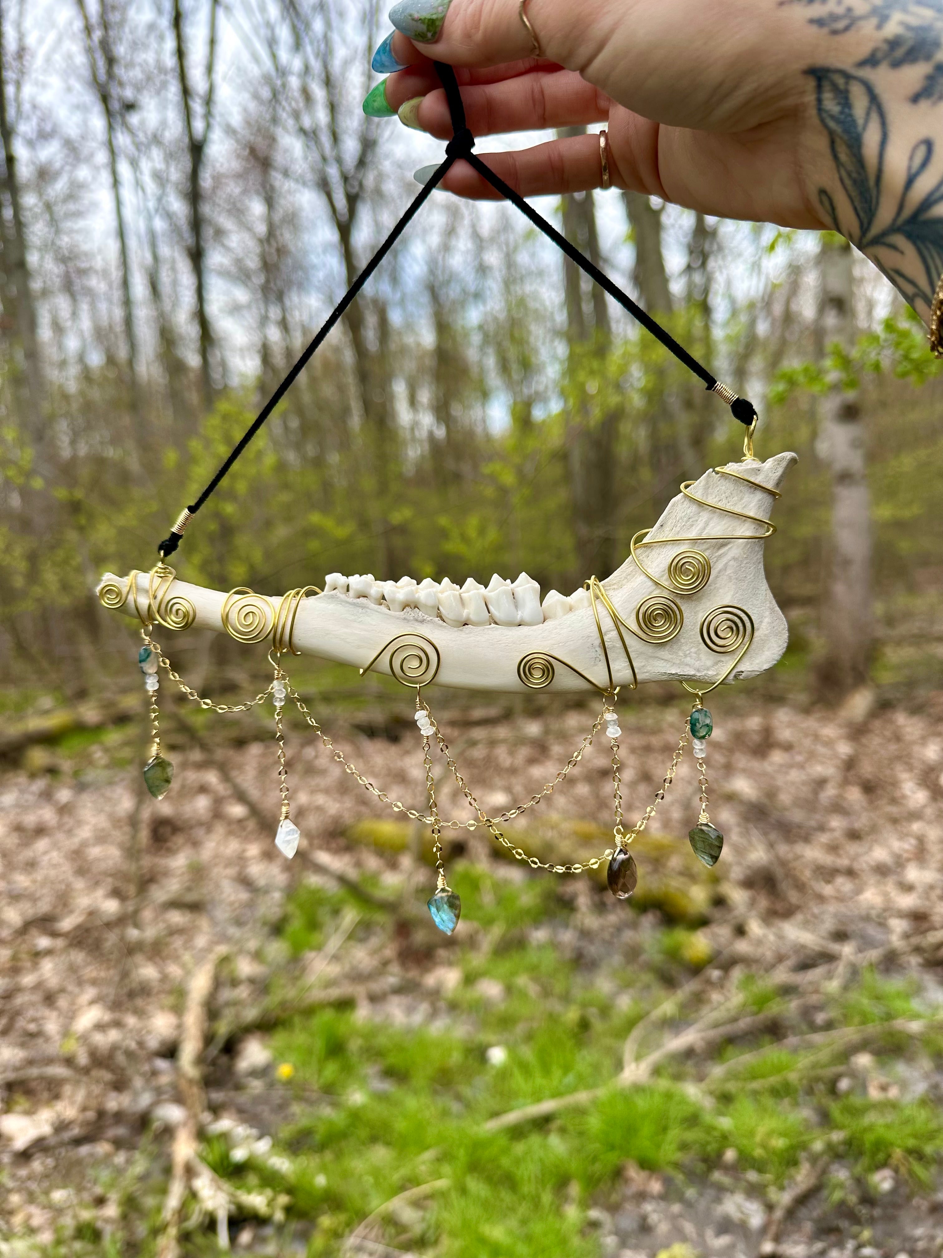 crystal adorned deer bone
