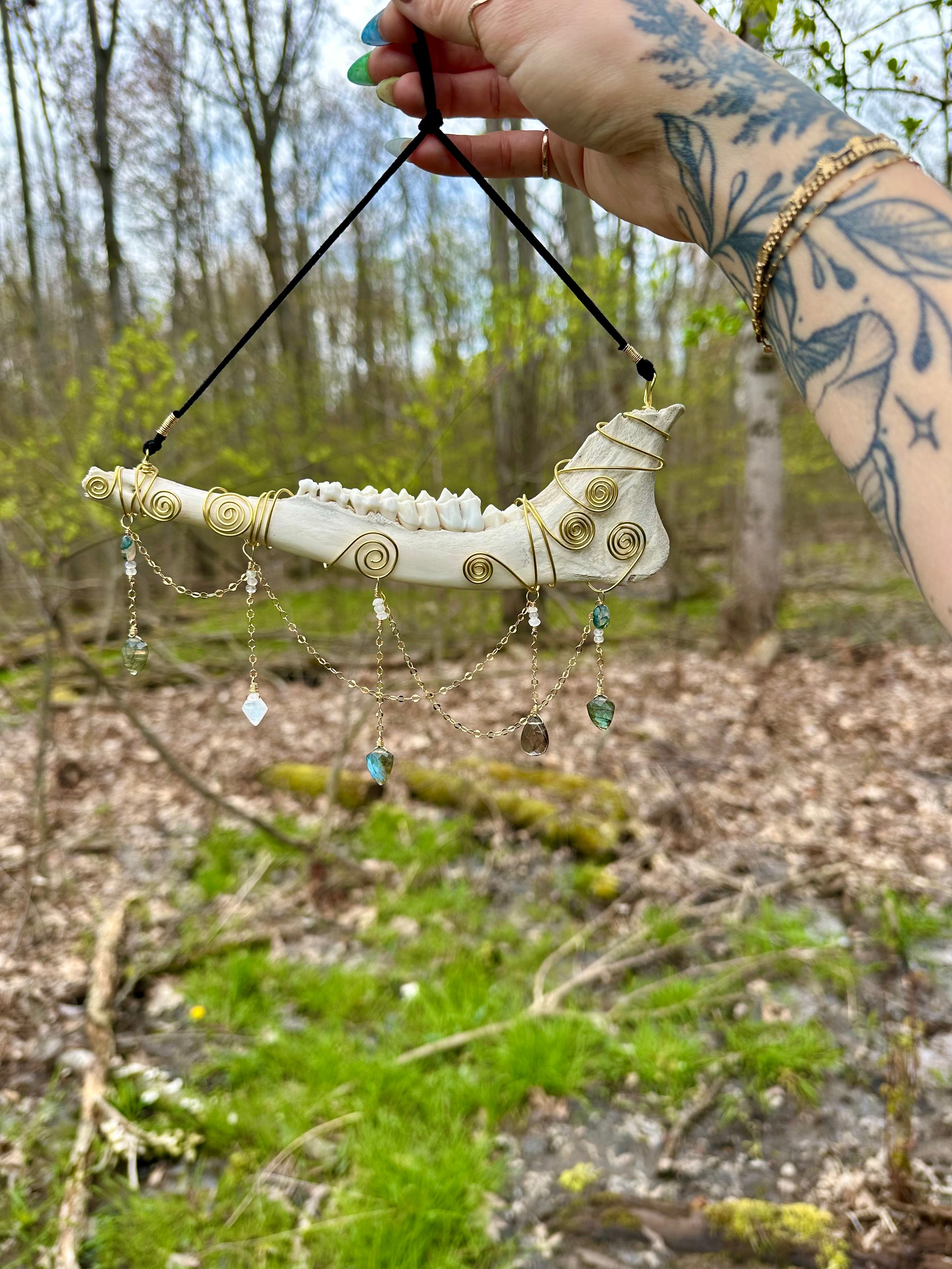 crystal adorned deer bone