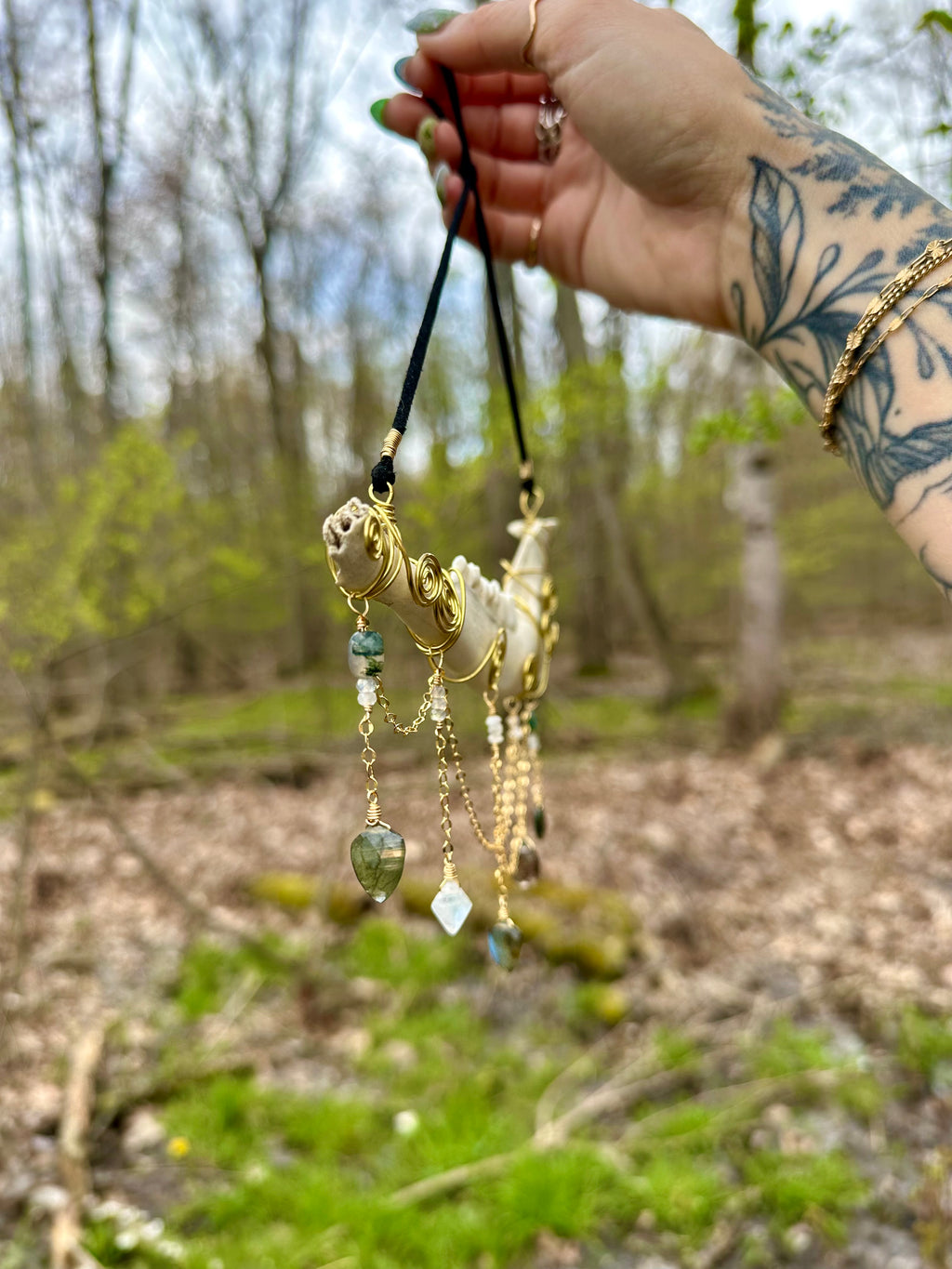 crystal adorned deer bone