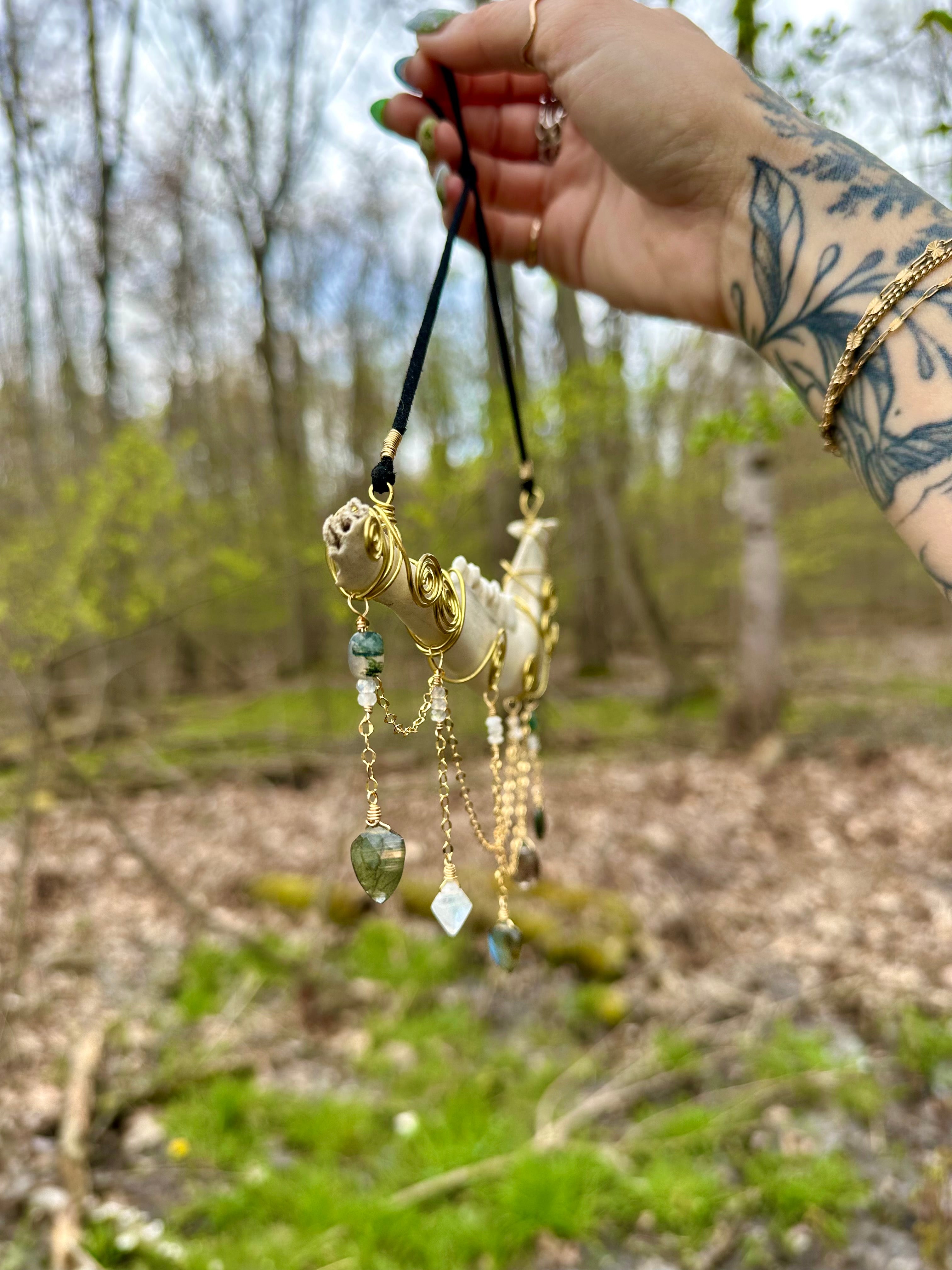 crystal adorned deer bone
