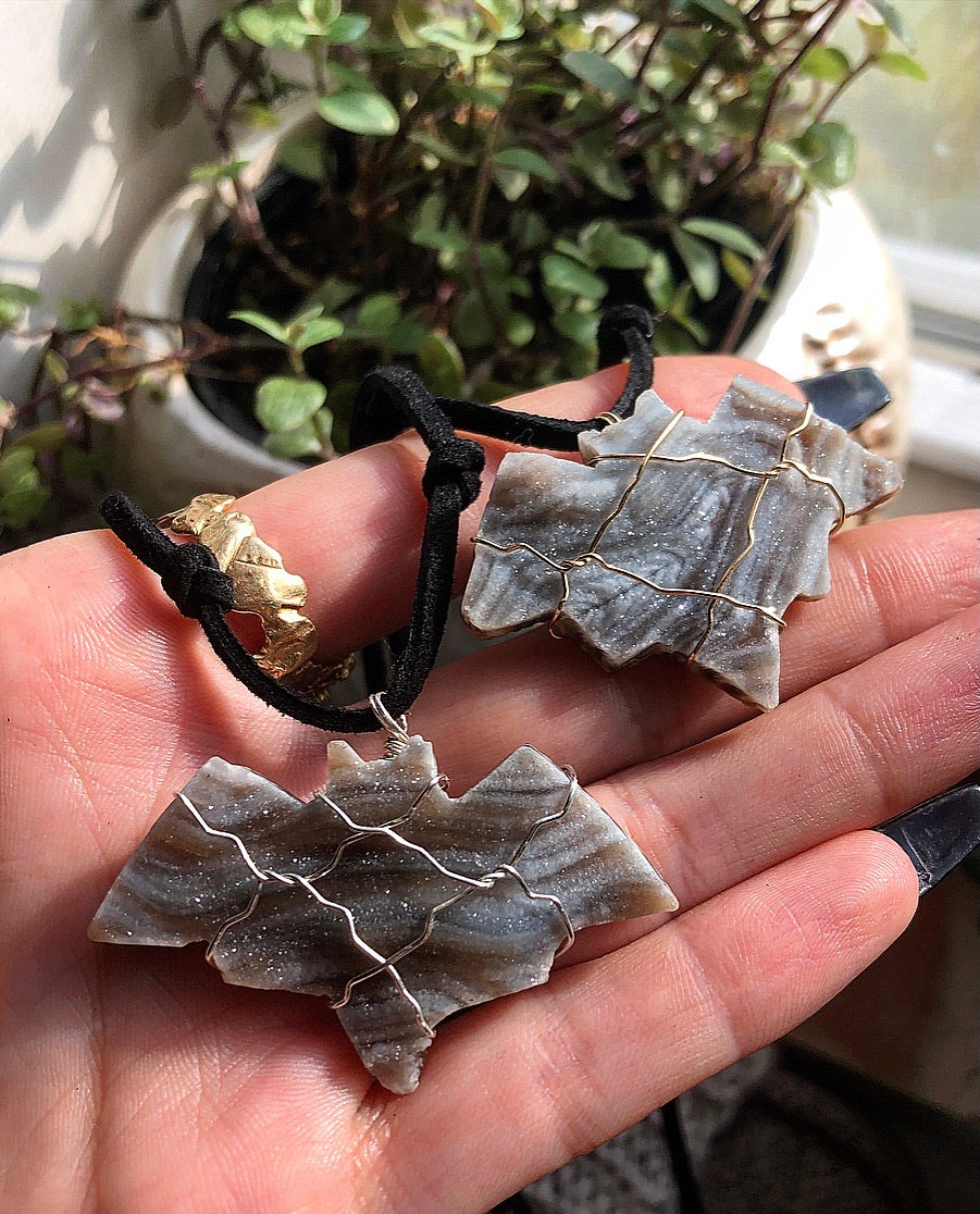 chalcedony crystal bat necklace