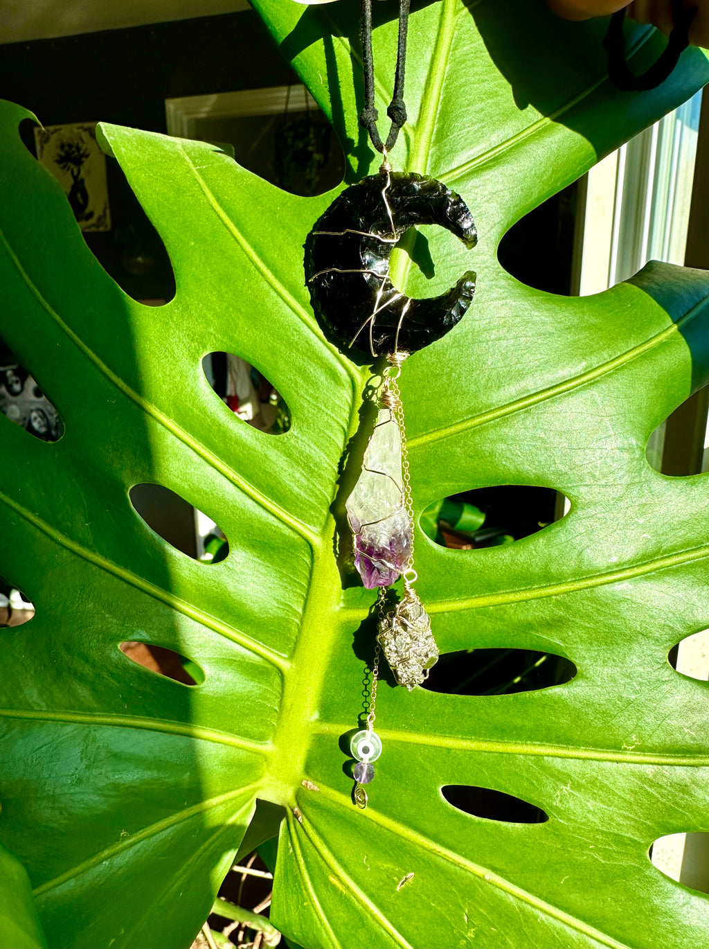 obsidian moon protection dangle